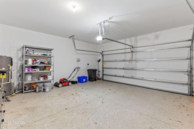 115 Pergola Pl, Ormond Beach, FL 32174 - garage with concrete block wall and a garage door opener