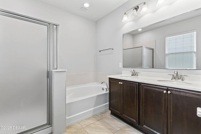 115 Pergola Pl, Ormond Beach, FL 32174 - full bathroom featuring a shower stall, a bath, and double vanity