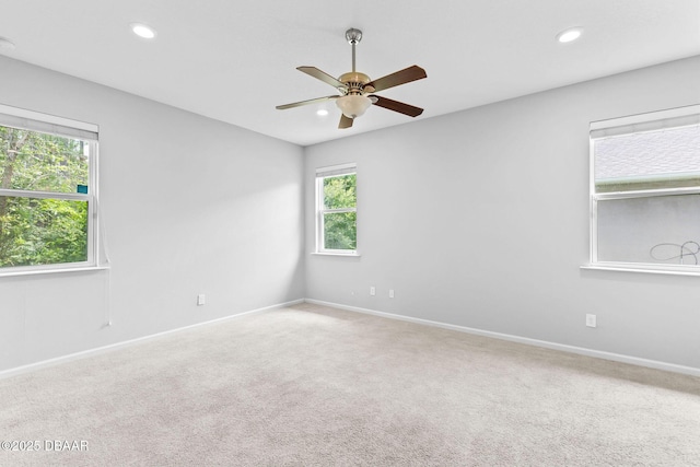 115 Pergola Pl, Ormond Beach, FL 32174 - carpeted empty room featuring plenty of natural light, a ceiling fan, and recessed lighting