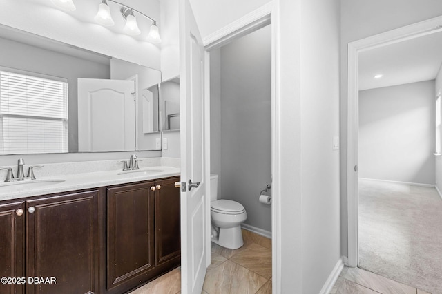 115 Pergola Pl, Ormond Beach, FL 32174 - bathroom featuring double vanity and toilet