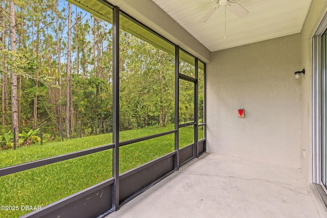 115 Pergola Pl, Ormond Beach, FL 32174 - unfurnished sunroom featuring a ceiling fan