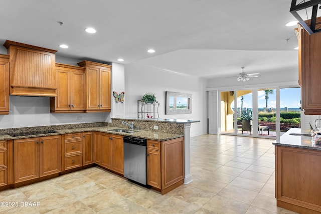 kitchen featuring stainless steel dishwasher, brown cabinets, a sink, and a peninsula
