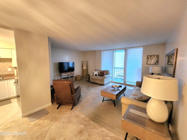2800 N Atlantic Ave Unit 1006, Daytona Beach, FL 32118 - living room featuring light tile patterned floors