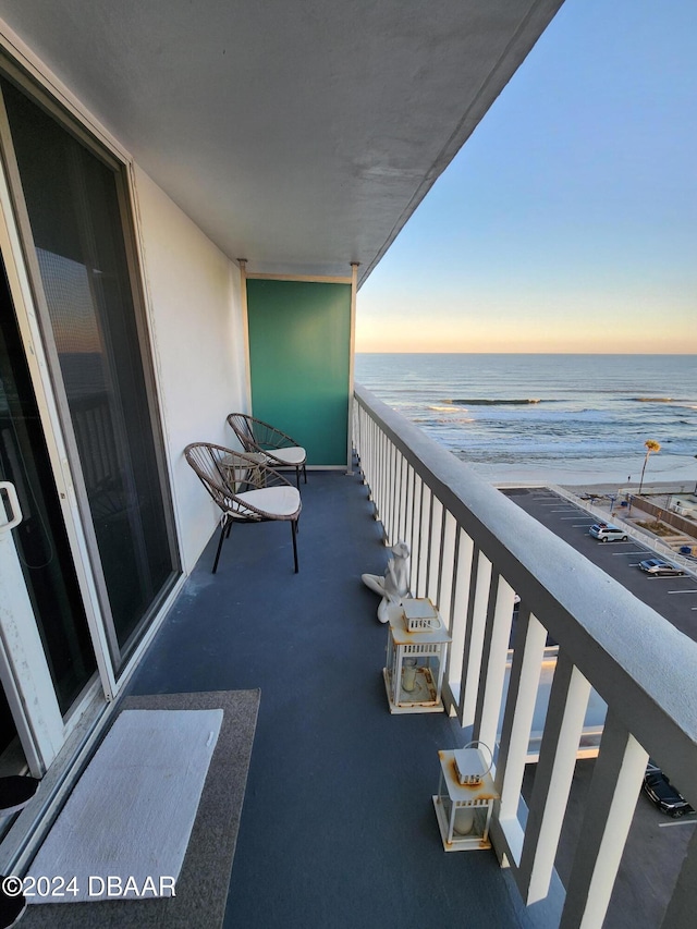 2800 N Atlantic Ave Unit 1006, Daytona Beach, FL 32118 - balcony at dusk with a water view