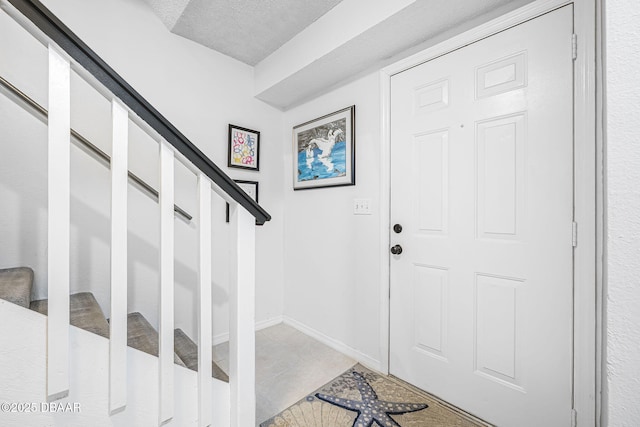 foyer with light tile patterned floors