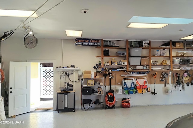 garage with a workshop area