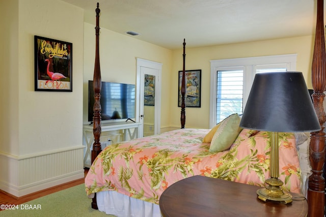 bedroom featuring hardwood / wood-style floors