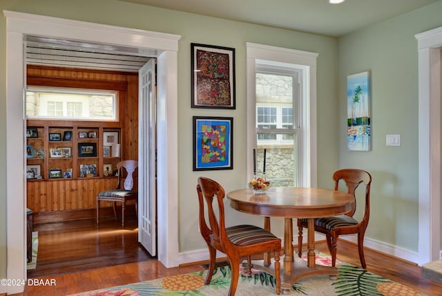 dining room with hardwood / wood-style floors