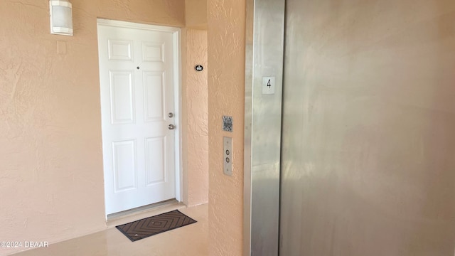 property entrance featuring elevator