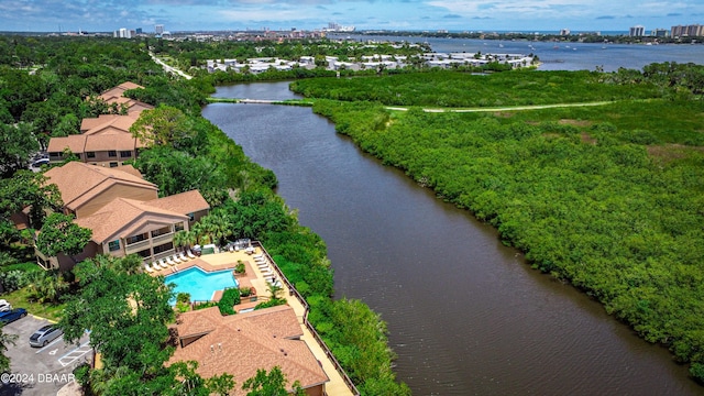 birds eye view of property with a water view