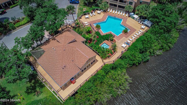 1401 S Palmetto Ave Unit 318, Daytona Beach, FL 32114 - view from above of property featuring a pool area and a nearby body of water