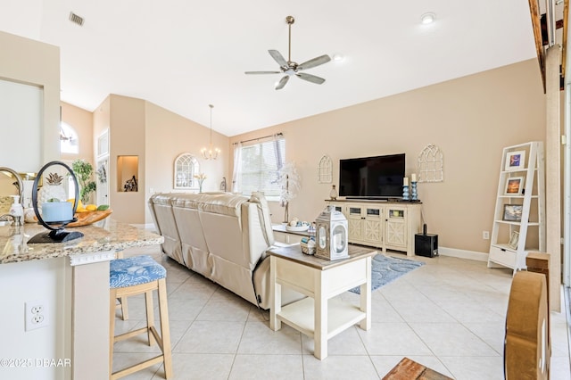 1405 Florida Moss Ln, Port Orange, FL 32128 - living room with a ceiling fan, lofted ceiling, plenty of natural light, a chandelier, and light tile patterned flooring
