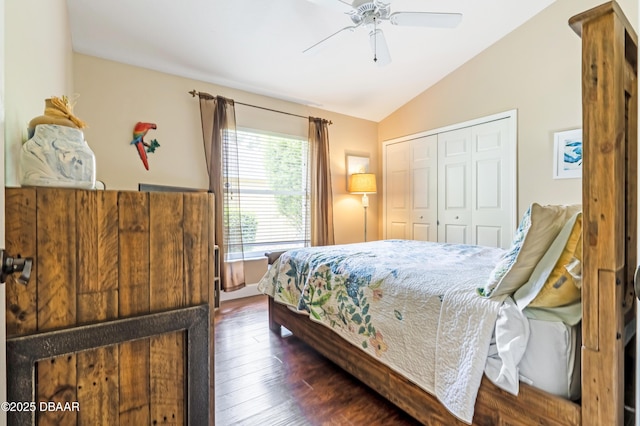 1405 Florida Moss Ln, Port Orange, FL 32128 - bedroom with lofted ceiling, a closet, dark wood-style floors, and a ceiling fan