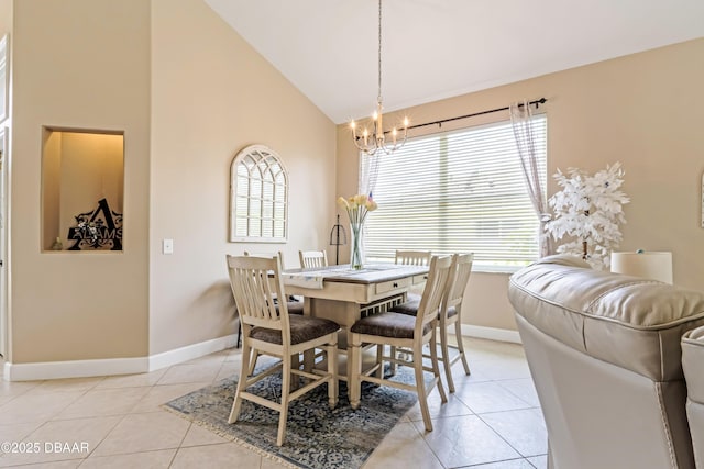 1405 Florida Moss Ln, Port Orange, FL 32128 - dining area with a chandelier, healthy amount of natural light, light tile patterned flooring, and high vaulted ceiling