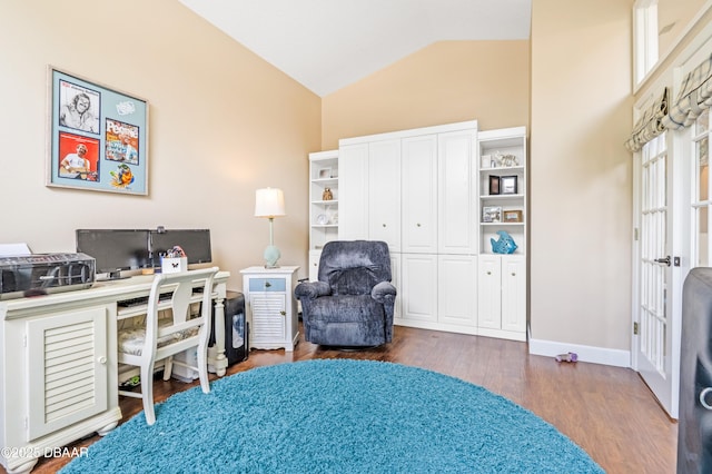 1405 Florida Moss Ln, Port Orange, FL 32128 - office area featuring wood finished floors and high vaulted ceiling