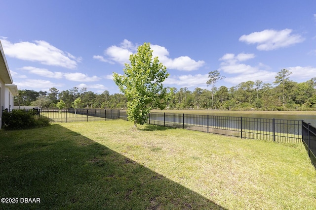 5567 Estero Loop, Port Orange, FL 32128 - view of yard featuring a fenced backyard and a water view