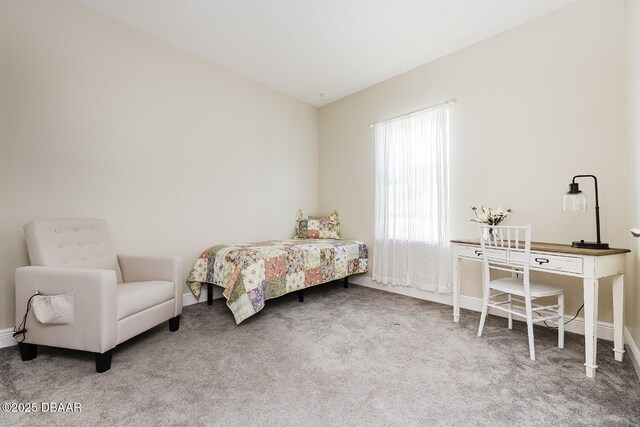 5567 Estero Loop, Port Orange, FL 32128 - carpeted bedroom featuring baseboards