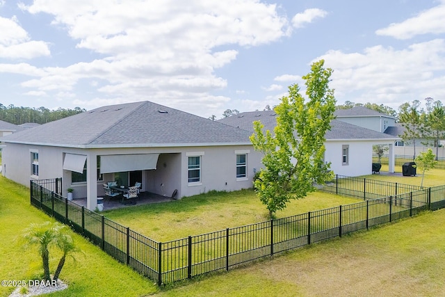 5567 Estero Loop, Port Orange, FL 32128 - rear view of house featuring roof with shingles, a patio, stucco siding, and a yard