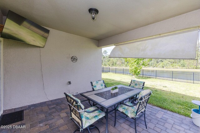 5567 Estero Loop, Port Orange, FL 32128 - view of patio / terrace with outdoor dining area and a fenced backyard