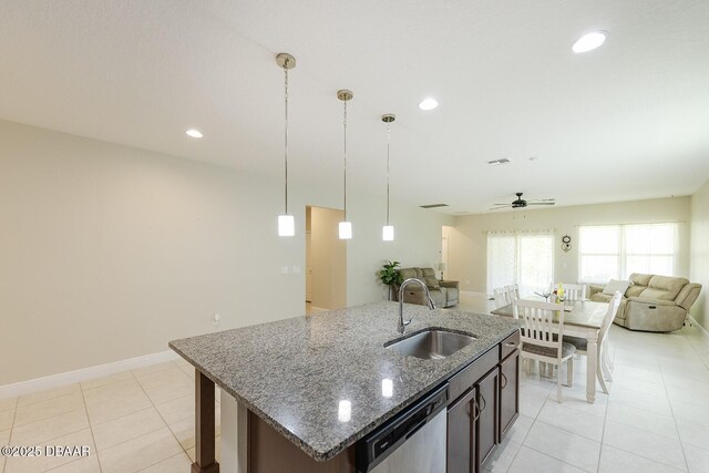 5567 Estero Loop, Port Orange, FL 32128 - kitchen with ceiling fan, a sink, open floor plan, light tile patterned floors, and stainless steel dishwasher