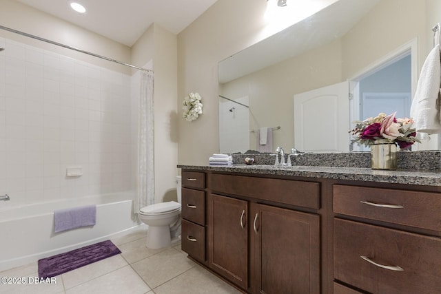 5567 Estero Loop, Port Orange, FL 32128 - bathroom featuring vanity, toilet, tile patterned floors, and shower / bath combo with shower curtain