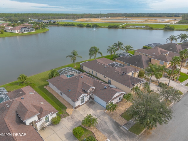 drone / aerial view with a water view