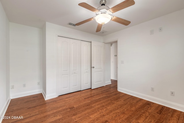 unfurnished bedroom with a closet, ceiling fan, and hardwood / wood-style floors