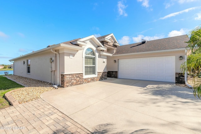 view of front of home with a garage