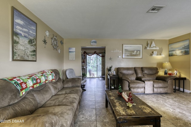 living room featuring tile patterned flooring