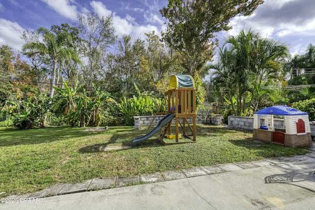 view of play area featuring a yard