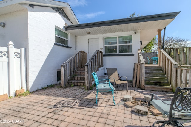 exterior space featuring an outdoor fire pit