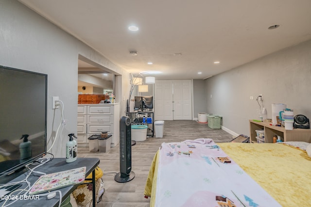 bedroom featuring light hardwood / wood-style floors