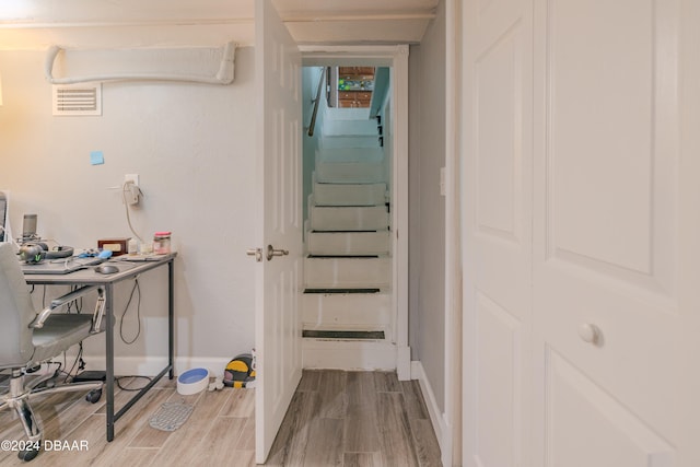 interior space with hardwood / wood-style flooring