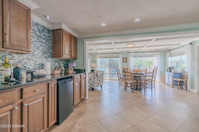 kitchen with ornamental molding, dark stone counters, backsplash, coffered ceiling, and dishwasher