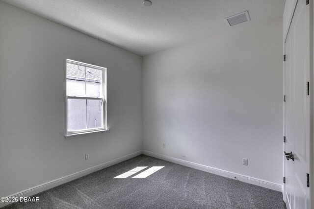 1316 Loftwedge Cir, Daytona Beach, FL 32124 - unfurnished room with carpet flooring and baseboards