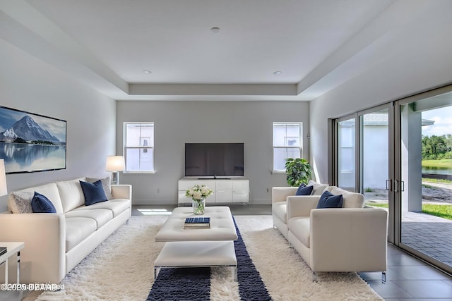 1316 Loftwedge Cir, Daytona Beach, FL 32124 - living room with plenty of natural light and a tray ceiling