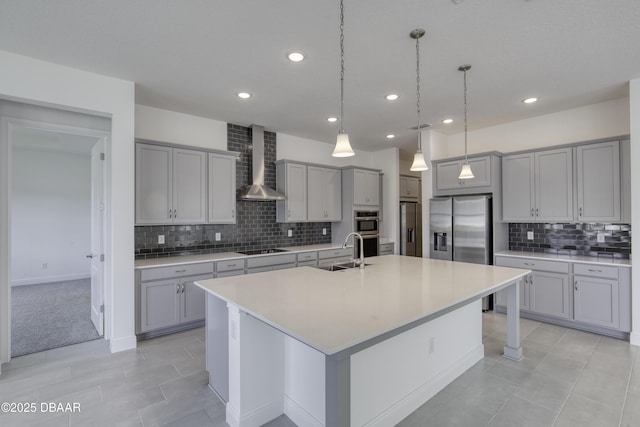 1316 Loftwedge Cir, Daytona Beach, FL 32124 - kitchen with gray cabinets, wall chimney exhaust hood, stainless steel appliances, tasteful backsplash, and recessed lighting