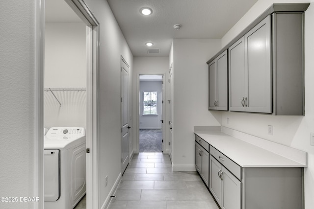 1316 Loftwedge Cir, Daytona Beach, FL 32124 - laundry area with washer / dryer, light tile patterned floors, and recessed lighting