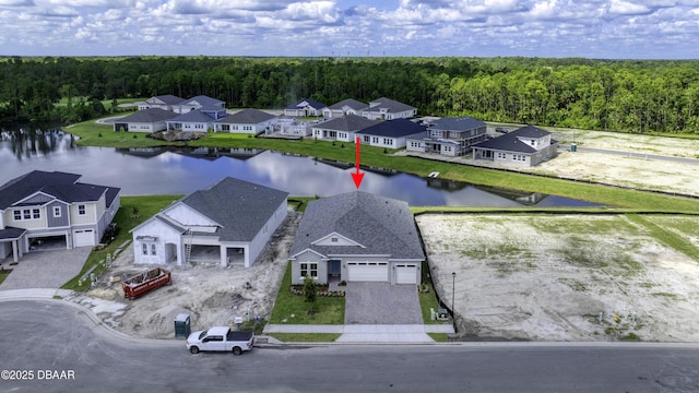 1316 Loftwedge Cir, Daytona Beach, FL 32124 - aerial perspective of suburban area featuring a forest and a nearby body of water
