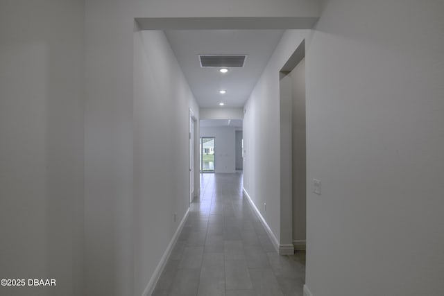 1316 Loftwedge Cir, Daytona Beach, FL 32124 - hall with recessed lighting and light tile patterned floors