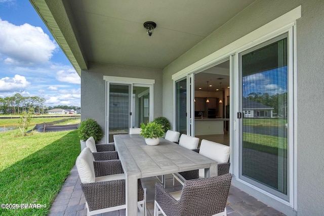 1316 Loftwedge Cir, Daytona Beach, FL 32124 - view of patio featuring outdoor dining space