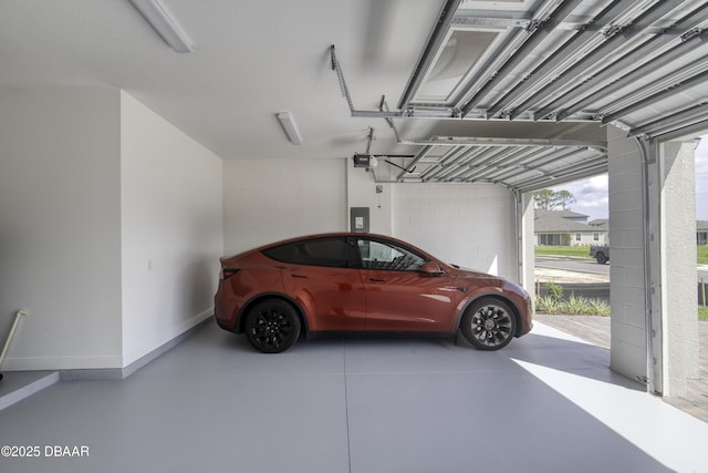 1316 Loftwedge Cir, Daytona Beach, FL 32124 - garage featuring a garage door opener and electric panel