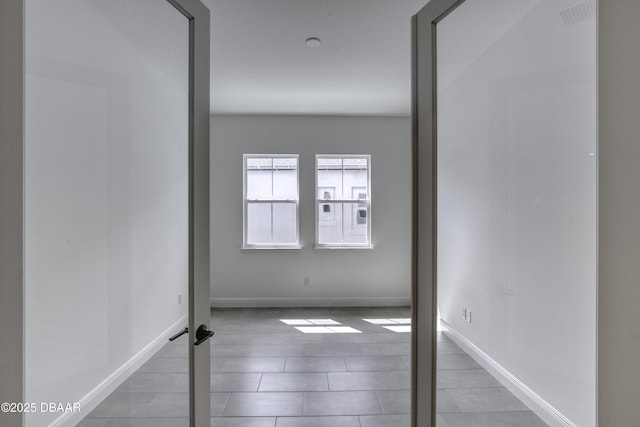 1316 Loftwedge Cir, Daytona Beach, FL 32124 - spare room featuring baseboards