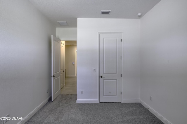 1316 Loftwedge Cir, Daytona Beach, FL 32124 - unfurnished bedroom featuring carpet floors and baseboards