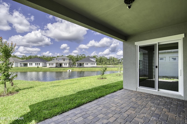 1316 Loftwedge Cir, Daytona Beach, FL 32124 - view of patio / terrace with a water view and a residential view