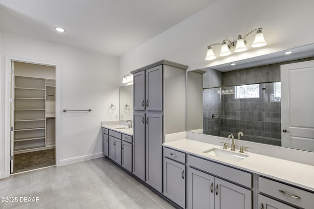 1316 Loftwedge Cir, Daytona Beach, FL 32124 - full bath featuring vanity, a tile shower, tile patterned floors, a walk in closet, and recessed lighting