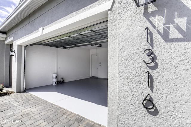 1316 Loftwedge Cir, Daytona Beach, FL 32124 - garage featuring a garage door opener
