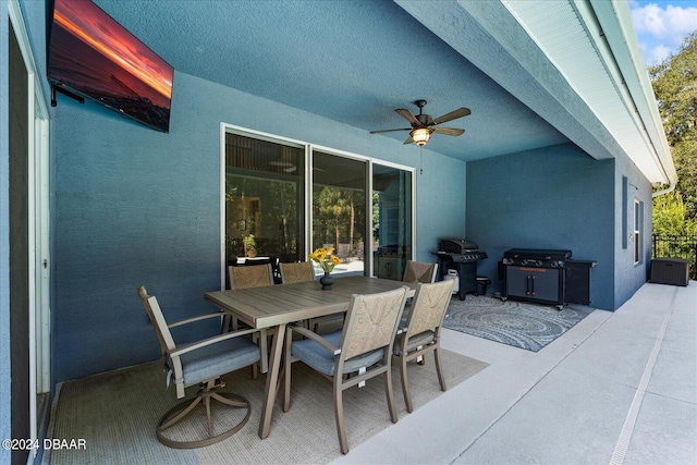 view of patio / terrace featuring a grill and ceiling fan