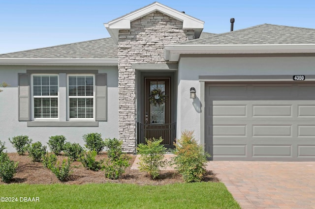 property entrance with a garage