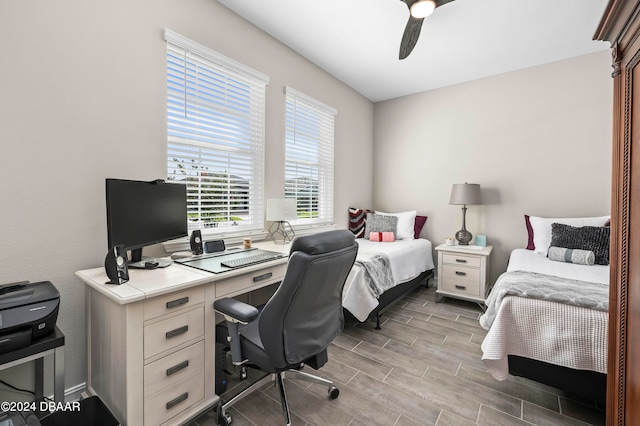 bedroom featuring ceiling fan and wood-type flooring